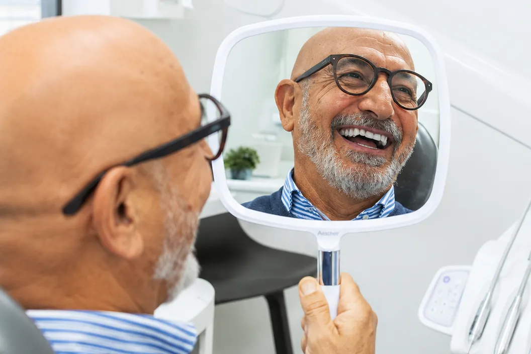 Patient discussing restorative dental care with a dentist